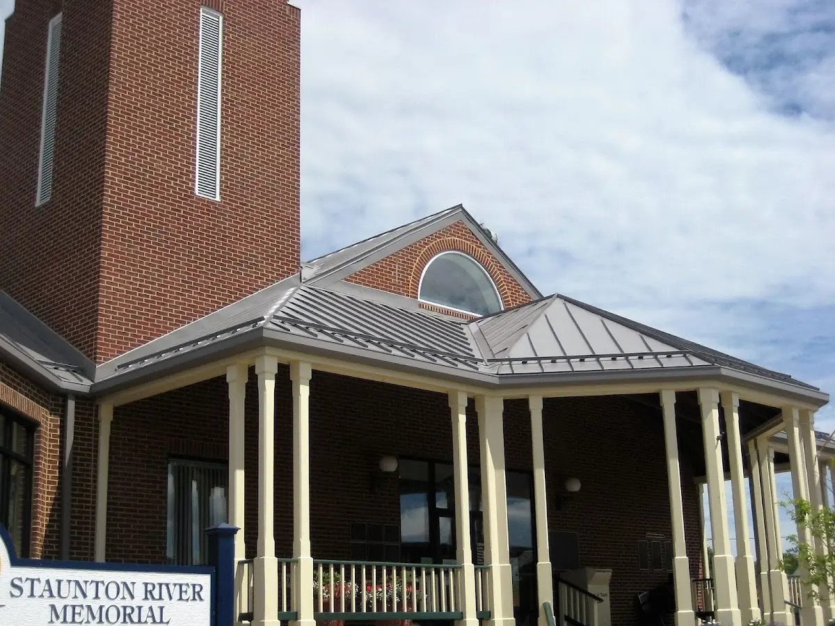 Skilled roofing craftsmen working on a residential roof in Brandy Wine